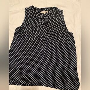 It is a blouse from the Loft brand,  it is used, like new a very nice blouse